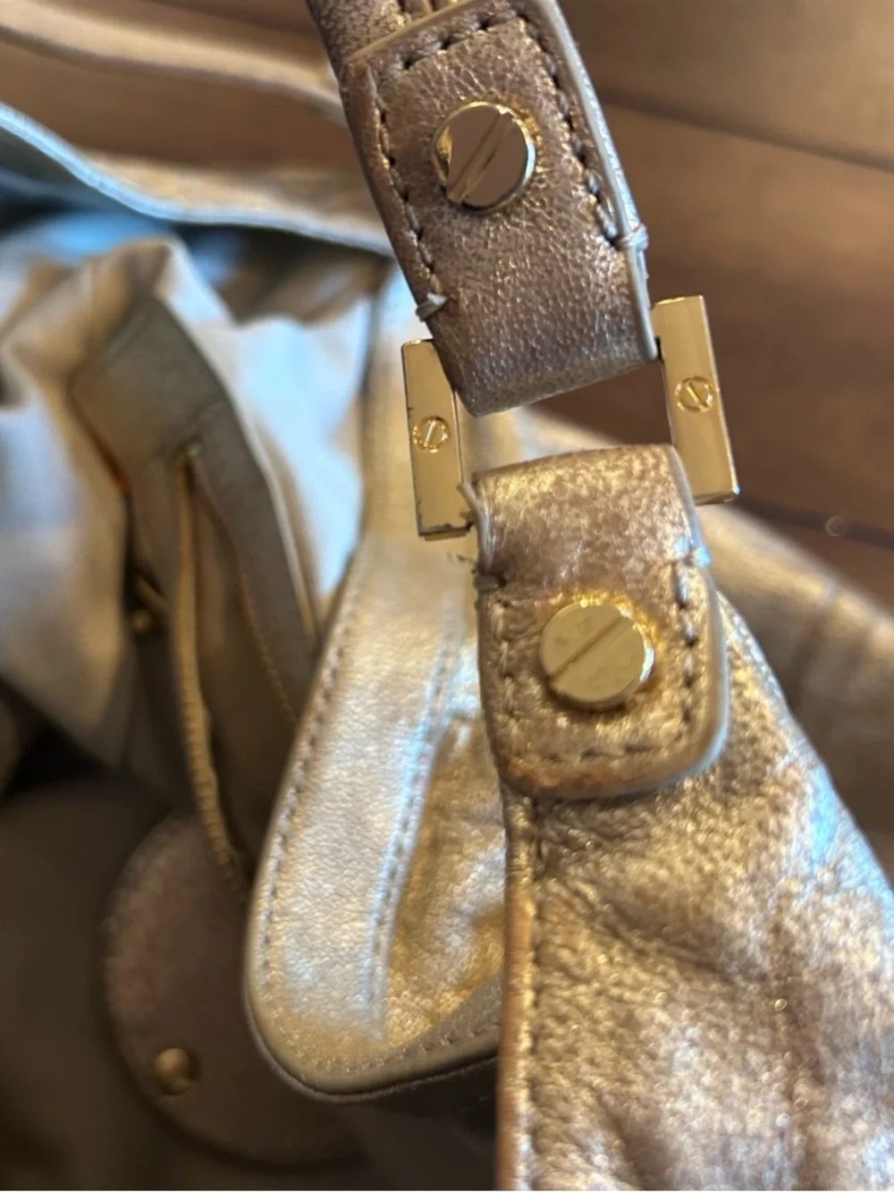 The Tory Burch Shimmer Gold Dean Hobo Bag MSRP 590.00